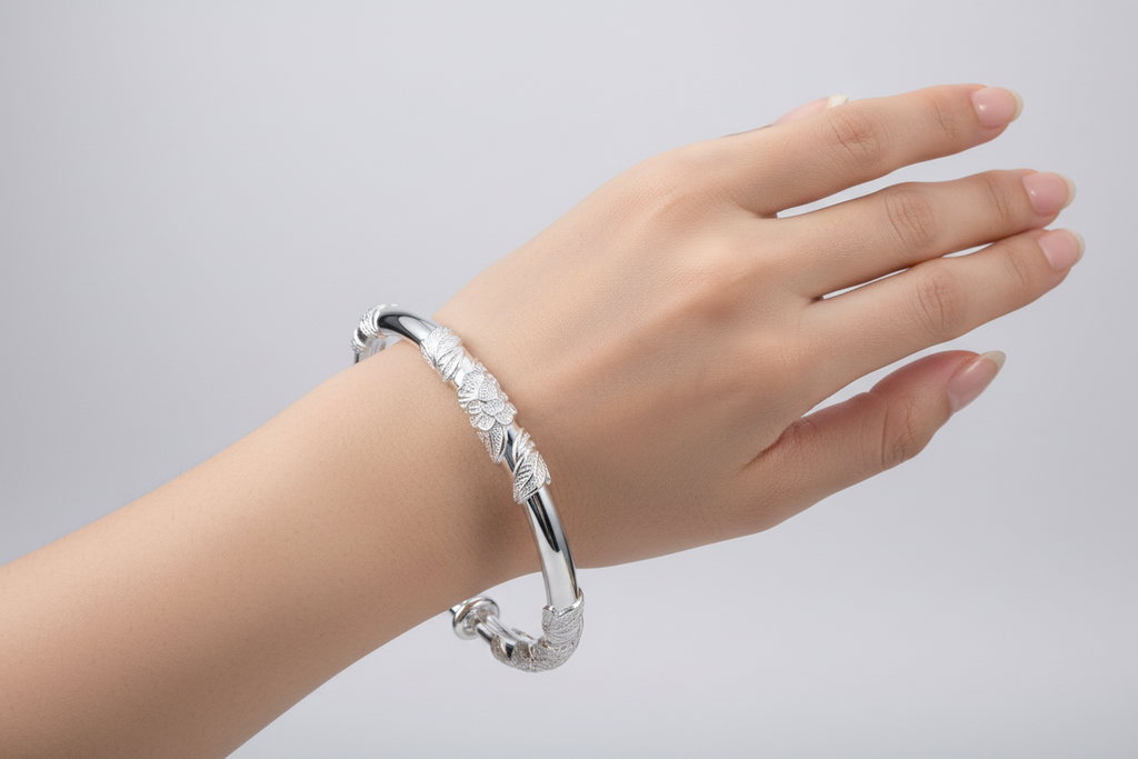 Elegant Floral Leaf Engraved Sterling Silver Bangle